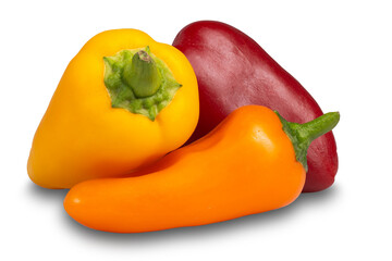 Three fresh paprika peppers of different colors on a white background isolate