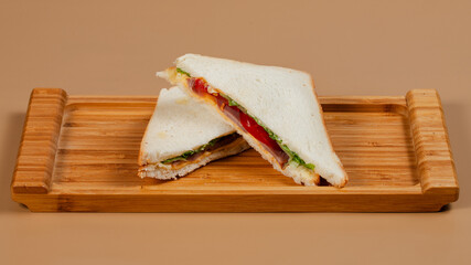 Sliced club sandwich on plate