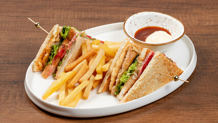 Sliced club sandwich on plate