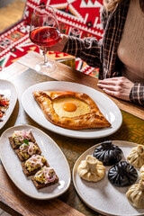 Georgian dinner with khachapuri and wine