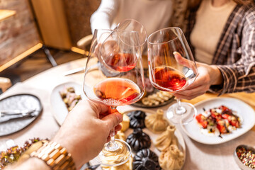 Toasting with wine over traditional Georgian meal
