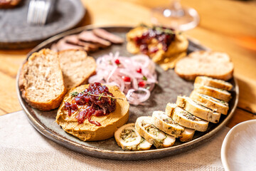 Assorted Georgian appetizer platter with spreads and meats