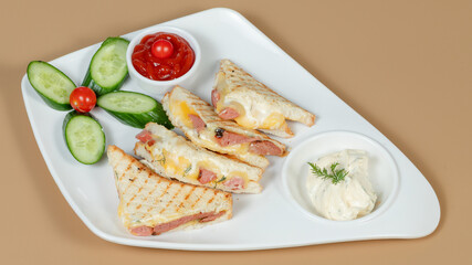 Sliced club sandwich on plate