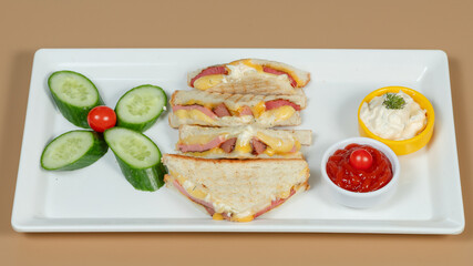 Sliced club sandwich on plate