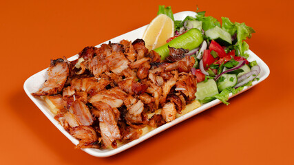 Delicious kebab plate isolated top view