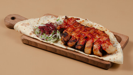 Delicious kebab plate isolated top view