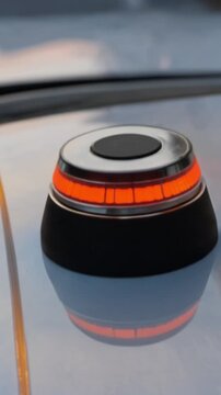 Homologated Emergency Vehicle Light (Luminous Beacon V16 DGT) for Damaged Cars &mdash; Mandatory Replacement by Warning Triangles, Road Safety Concept. Vertical Video 4K.