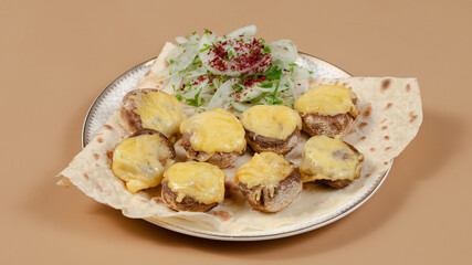 Delicious kebab plate isolated top view