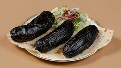 Delicious kebab plate isolated top view