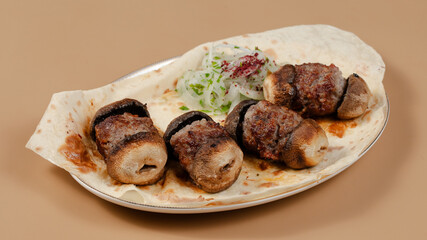 Delicious kebab plate isolated top view