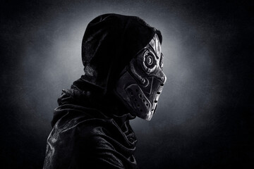 Robot android over dark misty background with clipping path