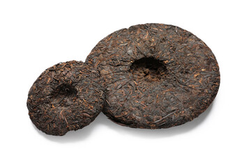 Dry compressed puer tea on white background