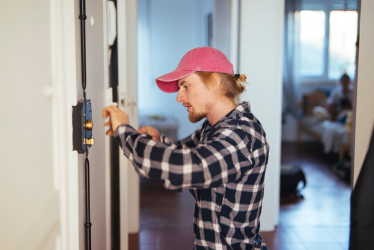 Technician ensuring lock functionality and proper alignment