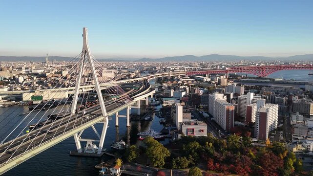Tempozan Bridge at Sunset, Konohana and Minato Ward, Osaka Bay, Japan: 4K Drone Views of Harbour, Wharf, Ferris Wheel, Ocean Reflections, Industrial Port, Minato Ward Skyline, Golden Hour Over Osaka