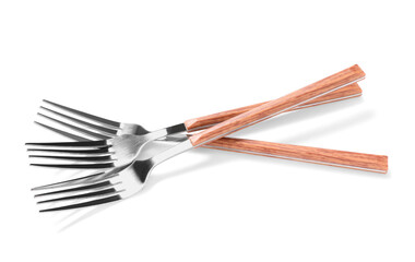 Silver forks on white background