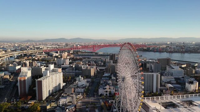 Port of Osaka, Konohana and Minato Ward, Japan: 4K Aerial Footage of Sunset Over Tempozan Wharf, Osaka Bay, Tempozan Ferris Wheel, Bridges, Cityscape, Harbour Lights, Scenic Evening Horizon