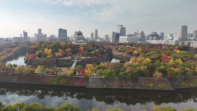 Osaka Castle, Chuo Ward, Osaka, Japan: 4K Aerial Drone Footage of Osaka Castle Park, Moat, Autumn Foliage, Historic Landmark, Japanese Architecture, City Skyline, Urban Landscape, O and Neya River