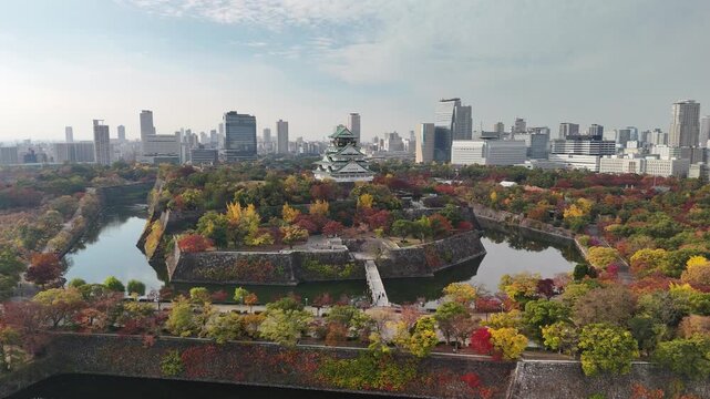 Osaka Castle, Chuo Ward, Osaka, Japan: 4K Aerial Drone Footage of Osaka Castle Park, Moat, Autumn Foliage, Historic Landmark, Japanese Architecture, City Skyline, Urban Landscape, O and Neya River