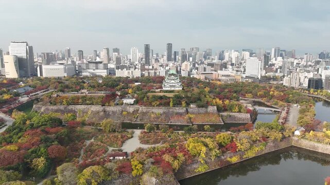 Osaka Castle, Chuo Ward, Osaka, Japan: 4K Aerial Drone Footage of Osaka Castle Park, Moat, Autumn Foliage, Historic Landmark, Japanese Architecture, City Skyline, Urban Landscape, O and Neya River
