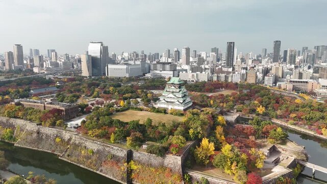 Osaka Castle, Chuo Ward, Osaka, Japan: 4K Aerial Drone Footage of Osaka Castle Park, Moat, Autumn Foliage, Historic Landmark, Japanese Architecture, City Skyline, Urban Landscape, O and Neya River