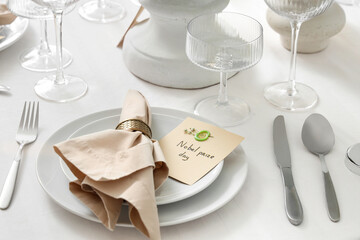 Table setting for Nobel prize day in room, closeup