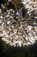 Background of Christmas Lights in the Dark. Vertical photo.