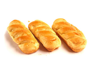 Three French soft and golden brioche rolls on white background. Premium top quality pastry product. Fine and delicate dessert.