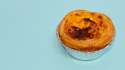 Closed up of Portuguese egg custard tart pastry. Pastel de nata with copy space