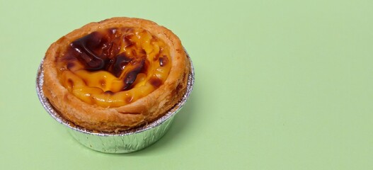Closed up of Portuguese egg custard tart pastry. Pastel de nata with copy space