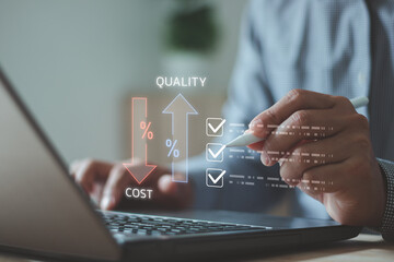 Increase quality and reduce cost represent quality, cost, and performance optimization for business strategy and resource efficiency. Businessman use digital checklist showing arrows Cost and Quality.