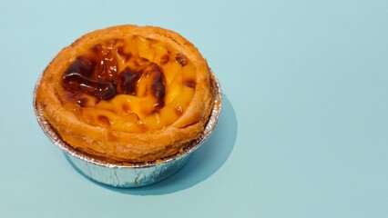 Closed up of Portuguese egg custard tart pastry. Pastel de nata with copy space
