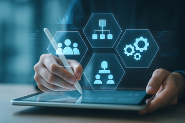 Hand using stylus to interact with futuristic digital interface showing organizational structure teamwork and process management icons