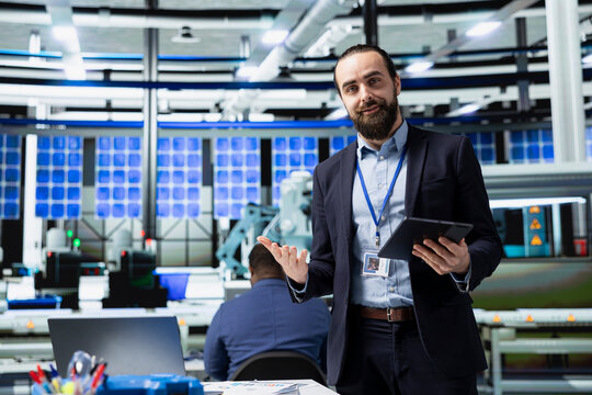 Master engineer discussing about the production at solar panels factory, using online conference to do a briefing and share insight. Professional inspector works for green energy.