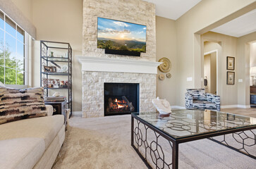 Comfortable Lounge With Warm Lighting, Relaxing Space Featuring Fireplace And Soft Furnishings