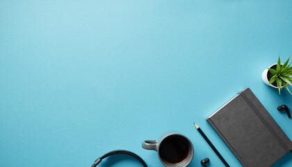 Modern workspace flat lay with coffee, notebook, and tech essentials for focus