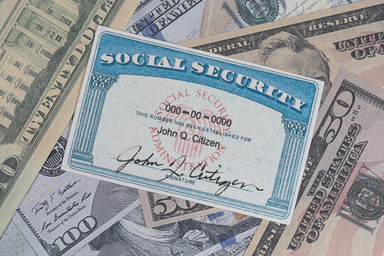 Fake Social security card on prop US currency