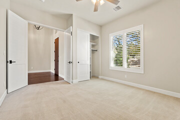 Simple Room Setup, Neutral Toned Bedroom With Features, Spacious Beige Bedroom With Natural Lighting