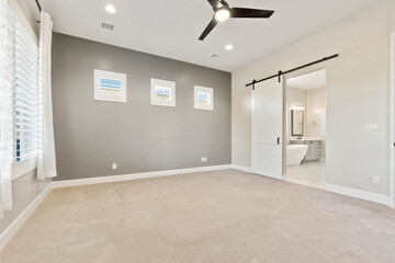 Expansive Living Area Designed For Social Gatherings With Contemporary Amenities And Natural Light