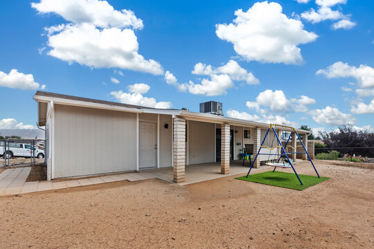 Charming Family Home with Playground in Serene Outdoor Setting