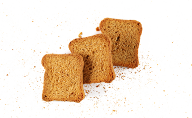 Pile rusks with wholewheat flour, sliced whole wheat dry bread with crumbs isolated on white background, top view