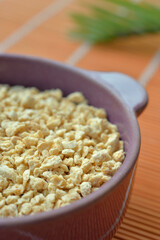 Dehydrated soy flakes in a bowl
