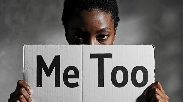 African American Woman Holding Me Too Sign Advocating for Social Justice and Awareness.