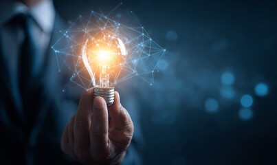 A Business Professional Holding a Glowing Lightbulb Surrounded by Digital Connections and Innovative Concepts for New Ideas