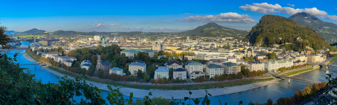 Aerial super panoramic View of the historic city of Salzburg city at the banks of Salzach river in Austria