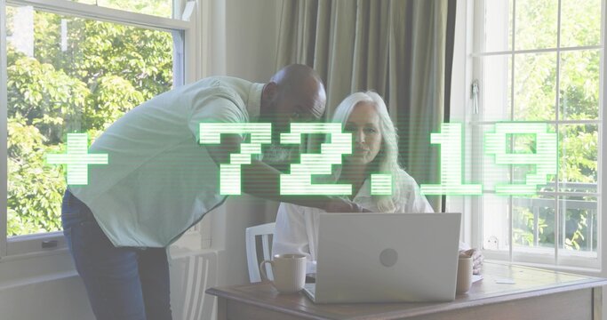 Pointing man in shirt helping senior woman in blouse using laptop at home phone, mugs +72 - Powered by Adobe