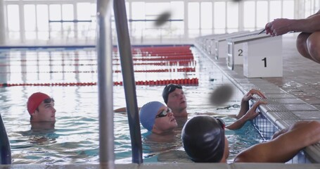 Gathering swimmers in swimwear with caps and goggles, practicing at pool edge, blocks 1-2 visible