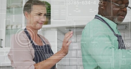 Holding smartphone, mature woman and man preparing meal in home kitchen, with aprons, HUD overlays