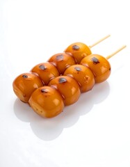 Sweet, golden, grilled rice balls