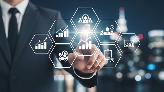 Businessman touches glowing digital interface displaying business analytics and team management tools against a blurred cityscape at night, symbolizing innovation. - Powered by Adobe