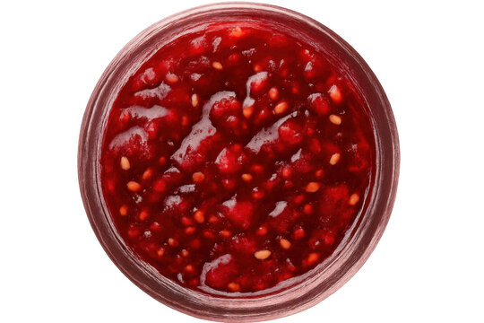 Raspberry jam in glass jar seen from top view with transparent background, sweet fruit spread with seeds